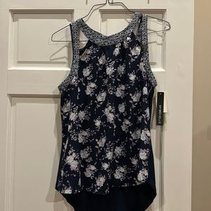 Dressy tank top, blue floral, plain navy on back. Size Large Brand new tags on